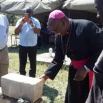 Rt. Rev. Valentine Kalumba, OMI., lays the building block.